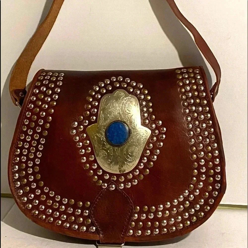 Handmade vintage studded leather moroccan bag